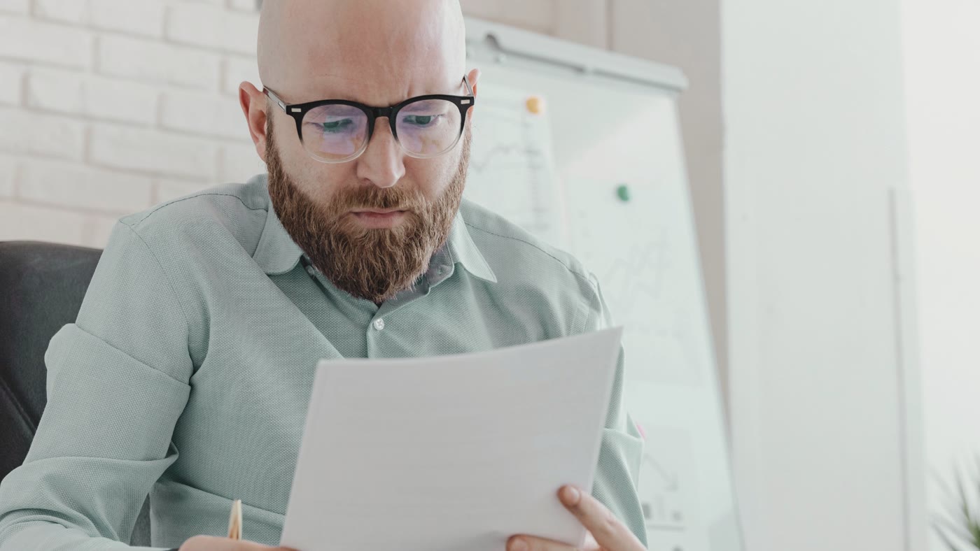A man reading a document